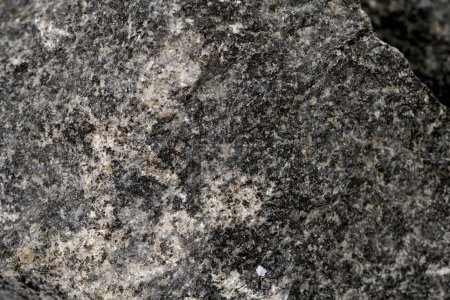 Téléchargez les photos : Texture pierre fond abstrait. Gros plan backdro roche minérale sombre naturelle - en image libre de droit