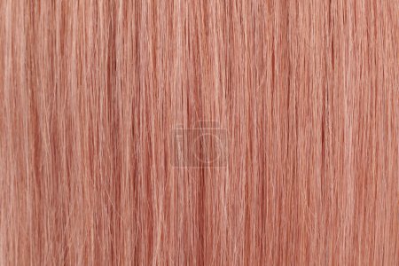 Foto de Vista de cerca del cabello brillante natural, ramo de fondo de rizos rubios rosados - Imagen libre de derechos