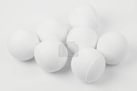 Photo for Set of sauna stones isolated on white background. Natural mineral rock, ceramic balls, imperial porcelain - Royalty Free Image