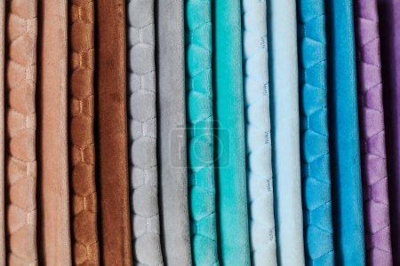 Photo for Colorful samples of upholstery fabrics close-up. Leather and suede for furniture renovation - Royalty Free Image