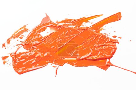 Photo for Acrylic paint blot, chaotic brushstroke, spot flowing on white paper background. Creative orange color backdrop, fluid ar - Royalty Free Image