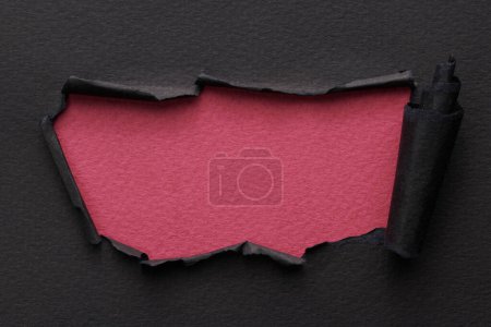 Photo for Frame of ripped paper with torn edges. Window for text with copy space black red burgundy colors, shreds of notebook pages. Abstract backgroun - Royalty Free Image
