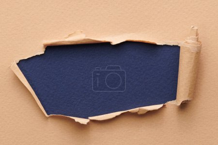 Photo for Frame of ripped paper with torn edges. Window for text with copy space blue beige colors, shreds of notebook pages. Abstract backgroun - Royalty Free Image