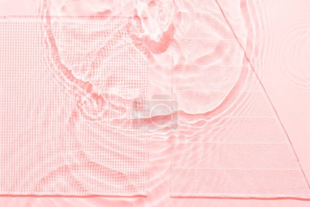 Photo for Water pink surface abstract background. Waves and ripples texture of cosmetic aqua moisturizer with bubbles and transparent ice glass insid - Royalty Free Image