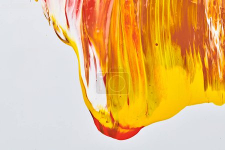 Photo for Acrylic paint blot, chaotic brushstroke, spot flowing on white paper background. Creative orange color backdrop, fluid ar - Royalty Free Image