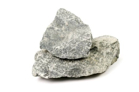 Foto de Conjunto de piedras de sauna aisladas sobre fondo blanco. Piedra mineral natural gabbro-diabasa - Imagen libre de derechos