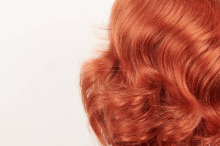 Photo for Natural looking shiny hair, red curls isolated on white background with copy space - Royalty Free Image