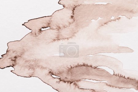 Foto de Fondo abstracto, manchas de pintura acuarela sobre papel blanco, tinta marrón - Imagen libre de derechos