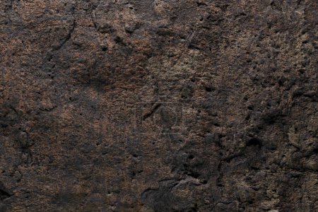 Foto de Textura de piedra marrón, fondo abstracto oscuro. Piedra mineral natural cerca de los detalles, fondo vacío con espacio de copia para el diseño - Imagen libre de derechos