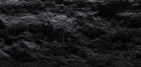 Black stone texture, dark abstract background. Natural mineral rock close up details, empty backdrop with copy space for design