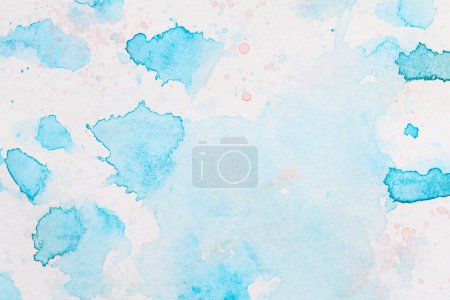 Photo for Abstract liquid art background. Blue watercolor translucent blots on white pape - Royalty Free Image
