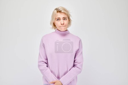 Photo for Portrait of girl with sad face offended and crying on white background. Nerves, stress, uncertainty concep - Royalty Free Image
