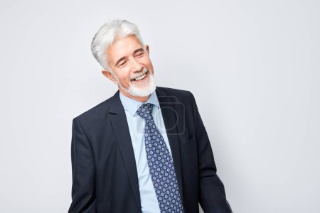 Photo for Portrait gray-haired man smiling joyfully with happy face isolated on white studio background, advertising banne - Royalty Free Image
