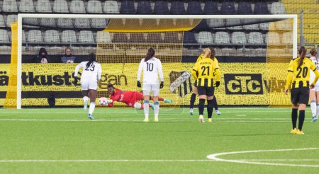 Photo for January 24th, 2024: Chiamaka Nnadozie saving penalty from Rosa Kafaji in BK Hacken in match between BK Hacken and Paris FC in UEFA Women's Champions League. Final result: 0-0. - Royalty Free Image