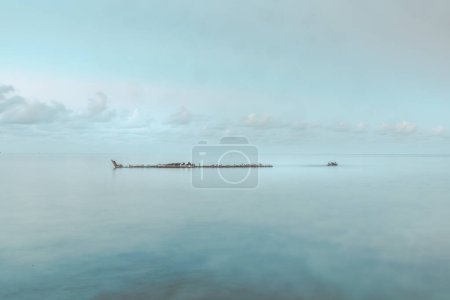 Minimalist shot of the shipwreck Gemma on the beach of Grand Cayman, Cayman Islands