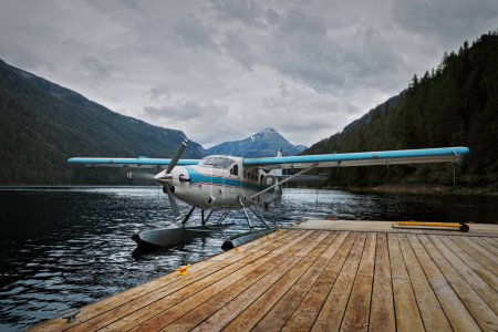 A floatplane in the fjords of Alaska at the pier