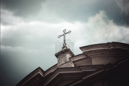 A cross on top of a building in Rome