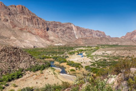 The green band of the Rio Grande River that leads through the Big Bend National Park, Texas USA