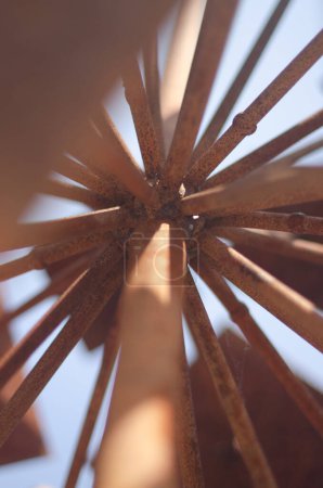 Bottom view of metal rods that are connected together . High quality photo