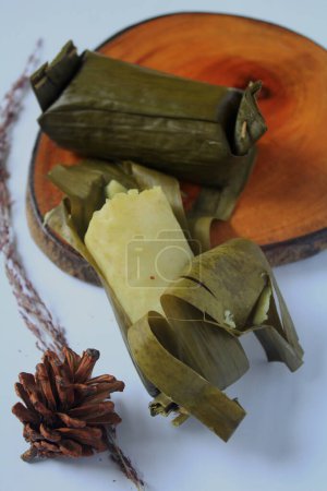 Arem - arem is a traditional Javanese snack in the form of rice containing chicken/beef or fried chili sauce, then wrapped in banana leaves in Semarang, Indonesia on March 27, 2021.