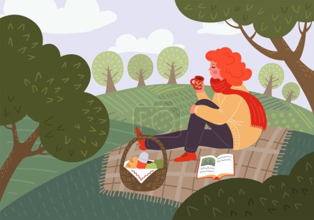 Woman drink tea and read book sitting on plaid on meadow or in the park. 
