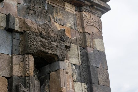 The ornament of Kala above the window in Candi Ijo landmark. This Candi or temple is located in Yogyakarta, Indonesia.