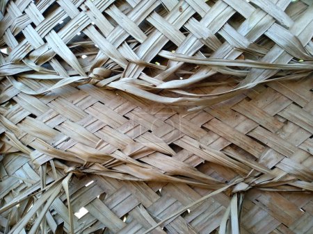 Woven coconut leaves. Palm leaf background. Leaves Background or Leaf Background for Decoration. Beautiful and Exotic Leaf. Plant Background and Tree Background.