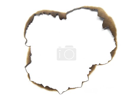 Téléchargez les photos : Fire holes in white paper. Collection of burnt holes in a piece of paper isolated on white background - en image libre de droit