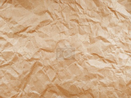 Foto de Textura de papel arrugado. Textura de papel arrugado marrón para el fondo - Imagen libre de derechos