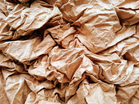 Foto de Textura de papel arrugado. Textura de papel arrugado marrón para el fondo - Imagen libre de derechos