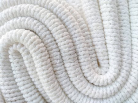 Foto de Ropa de punto de hilo de lana. Fondo de hilo de lana para el marco de hilo. Hilados de punto blanco para el fondo de artesanía - Imagen libre de derechos