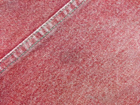 Jeans-Textur. Denim Hintergrundstruktur für Design. Leinwand-Denim-Textur. roter Denim, der als Hintergrund verwendet werden kann. rote Jeans Textur für jeden Hintergrund