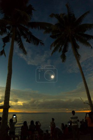 Photo for See a ring solar eclipse on the beach - Royalty Free Image