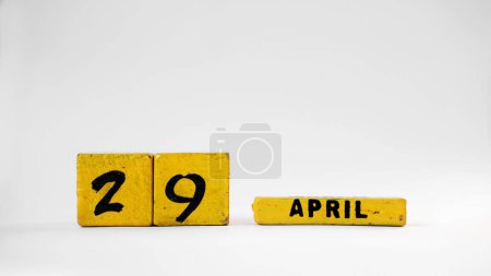 29. APRIL Holzkalender. Internationaler Tanztag. Weißer Hintergrund mit Platz für Ihren Text.