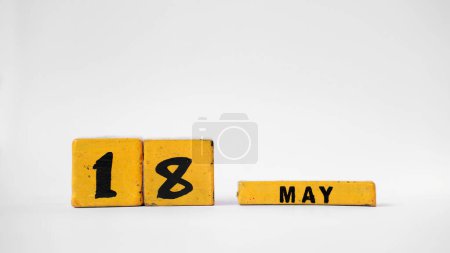 MAY 18 Wooden calendar. International Museum Day. White background with space for your text
