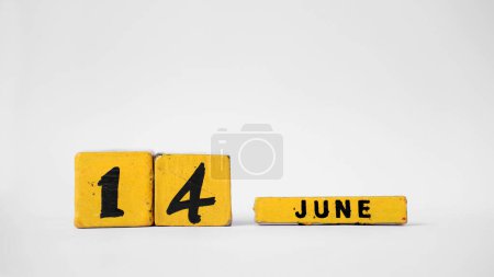 JUNE 14 Wooden calendar. World Blood Donor Day. White background with space for your text
