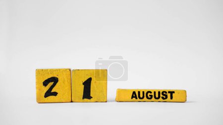 AUGUST 21 Wooden calendar. International Day of Remembrance and Tribute to the Victims of Terrorism. White background with space for your text