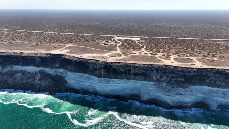 An aerial view of the flat lands of the Nullarbor and the cliffs Great Australian Bight