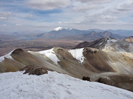 Volcano Cerro Acotango, in Bolivia. Climbing the Cerro Acotango, at border between Bolivia and Chile. 6052 meters high, with stunning views of the volcanoes Sajama and Parinacota. 