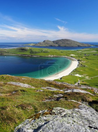 Photo for Vatersay, a stunning beach in the Isle of Barra. Outer Hebrides. Scotland. Vatersay Bay is a beautiful sandy bay with a wide expanse of sand dunes. Vatersay, south of the isle of Barra, is the most southerly inhabited island of the Outer Hebrides. - Royalty Free Image
