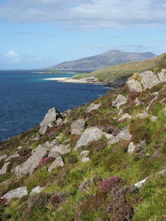 Photo for Hidden beach near Huisinish beach, west coast of Harris in the Outer Hebrides. Scotland. Nearby, and to the north, lies the uninhabited island of Scarp, the location of an experimental rocket postal service in the 1930s. - Royalty Free Image
