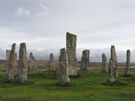 Photo for Callanish or Calanais Standing Stones. Isle of Lewis, Scotland. This is a cruciform shaped stone circle, erected 5000 years. It is one of Scotlands most magnificent and preserved Neolithic monuments. - Royalty Free Image