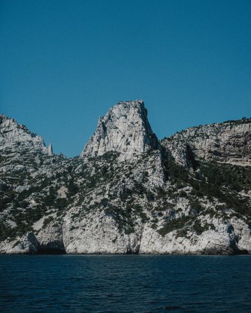 Steep cliffs of the Calanques rising above the Mediterranean