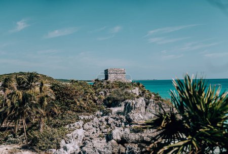 Ancient Mayan ruins in Tulum, Mexico under clear skies