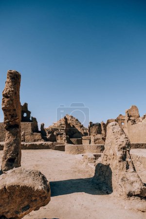 Ruins of ancient mud-brick structures in Siwa Oasis, Egypt
