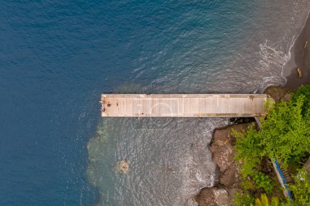 Overhead tranquility on a pier in Martinique's turquoise embrace