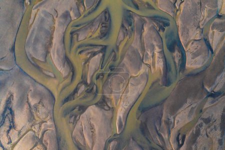 Aerial view of colorful river delta patterns in Longyearbyen, Svalbard