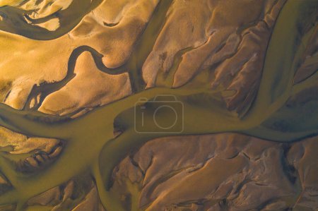 Aerial view of colorful river delta patterns in Longyearbyen, Svalbard