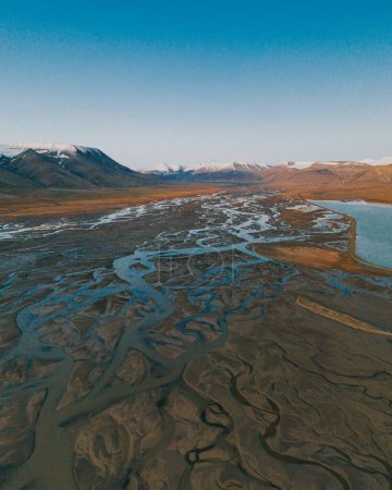 Aerial view of a winding river delta in Longyearbyen, Svalbard