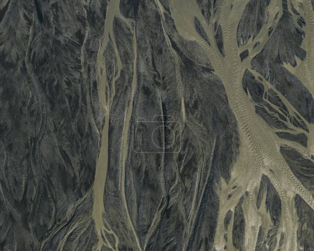Aerial close-up of intricate river patterns and textures in South Iceland